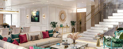 Luxury Azizi Florence townhouse living room interior featuring an elegant marble staircase, plush seating, gold accents and a refined dining area.